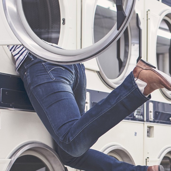 Woman stuck in a washing machine